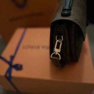 Louis Vuitton crossbody bag.